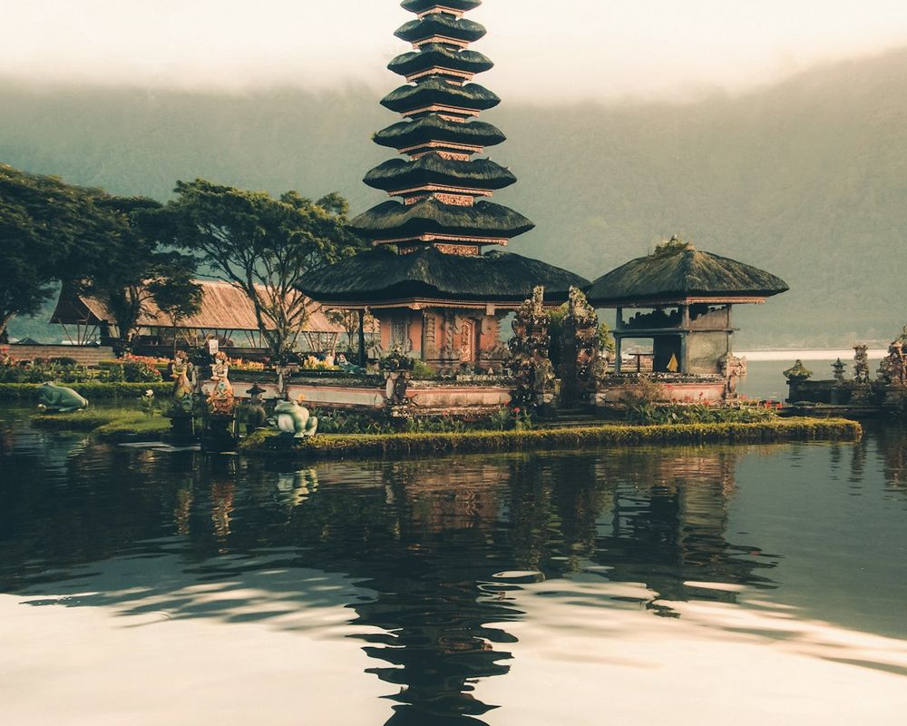 Pura Ulun Danu Bratan, a tiered water temple, reflected in the still surface of Lake Bratan