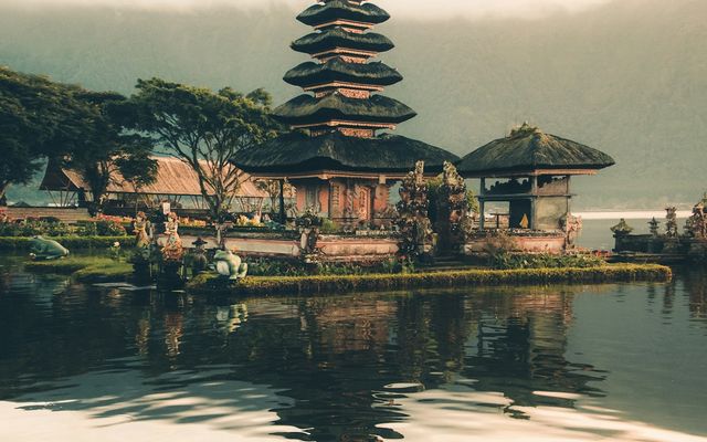 Pura Ulun Danu Bratan, a tiered water temple, reflected in the still surface of Lake Bratan